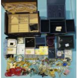 A quantity of costume jewellery, a good-quality jewellery case with key, in original carton and a