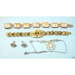 An 800-silver-mounted bracelet of seven rectangular shell cameos of classical scenes, a paste-set