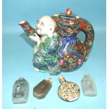 A 20th century Chinese famille-decorated figural teapot and four modern Oriental scent bottles, (5).