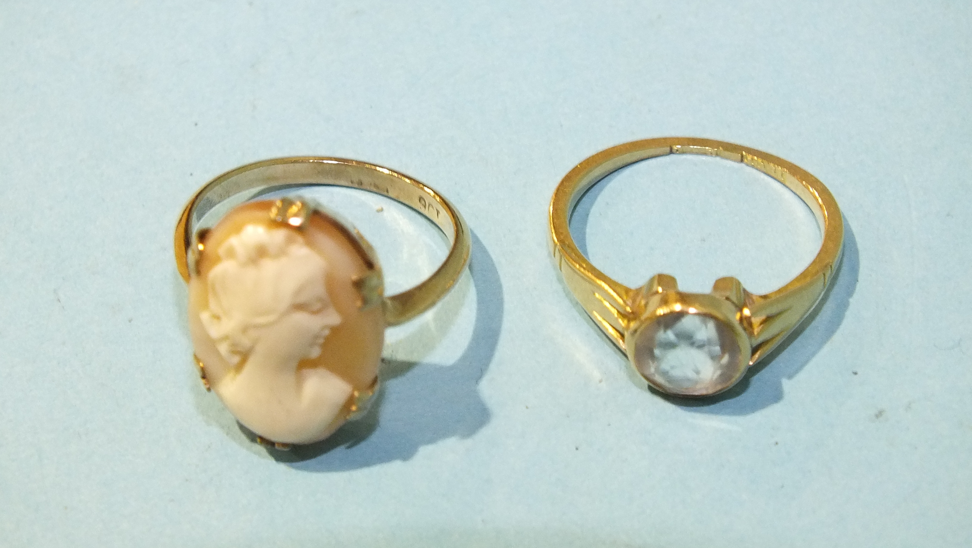 A 9ct gold ring set cameo, size L, 2.8g and an 18ct gold ring set white stone, (a/f), size K, 2.