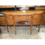 A George III mahogany and rosewood-banded breakfront sideboard, on square tapered legs, 153cm