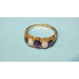 A 9ct gold ring set two opals and three graduated amethysts, size P, 3.6g.