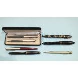 A Sheaffer 'Lifetime' fountain pen, 'The Unique' fountain pen, three other fountain pens and two