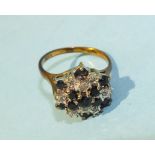 A sapphire and diamond cluster ring in 9ct gold mount, size M, 3.9g.