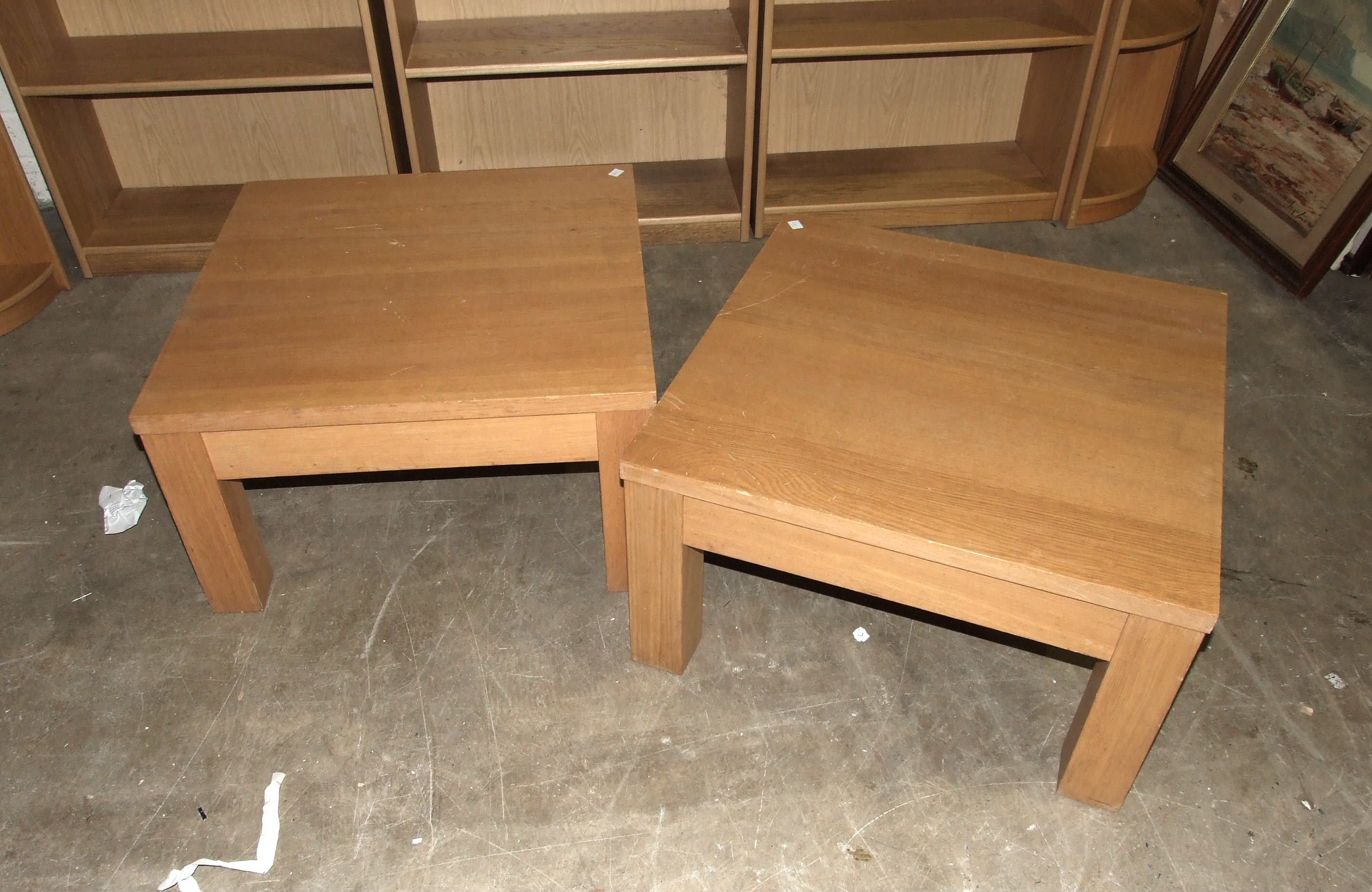 A pair of modern oak block-built low coffee tables, 70cm square, (2).