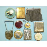 A 1950's painted powder compact decorated with Scottish terriers, a white metal chain purse and