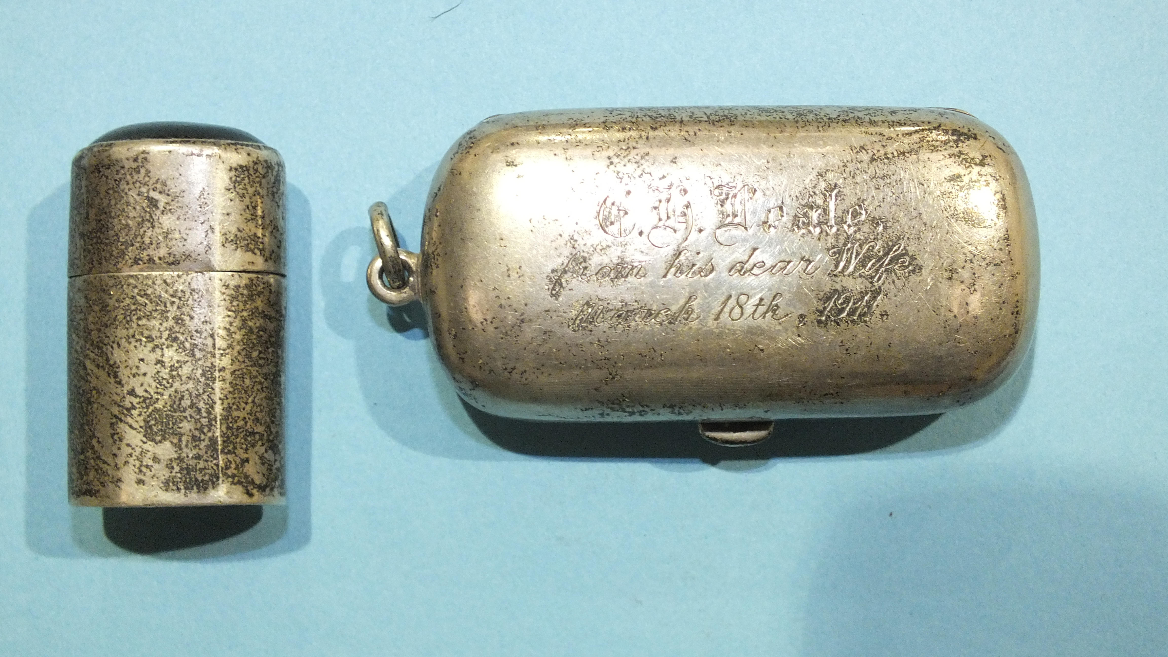 A silver sovereign and half-sovereign case, Birmingham 1907 and a small silver pill box, (2).