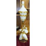 A Murano white and amber glass lamp in the form of two dancing figures, with inverted bell shape
