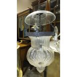 A shaped moulded hanging glass light fitting, with glass smut cover, 52cm high.