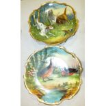 A pair of Austrian decorative wall plates decorated with game birds and hunting dogs, 30cm and a