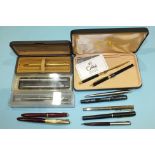A Mabie, Todd & Co. 'Swan' self-filler fountain pen, with 14ct nib, a Parker Slimfold fountain