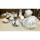Approximately thirty-five pieces of Poole two-tone chocolate-coloured tea ware, (undamaged), a