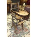 An Edwardian child's metamorphic stained wood high chair.