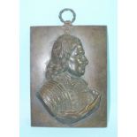 A 19th century bronze profile bust of Oliver Cromwell applied to a bronze plaque, with hanger,