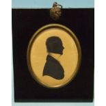 John Field, an oval painted silhouette of a gentleman wearing a white stock, signed Field, 2 Strand,