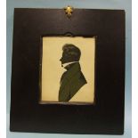 An early-19th century rectangular painted portrait silhouette of E J J G Edwards in black and