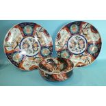 A pair of late-19th century Chinese Imari decorated chargers, 40cm diameter and a circular bowl,