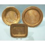 Three small Cairo ware dishes, 13cm, 18cm and 20cm diameter, (3).