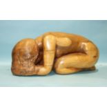 Arthur Morris, a yew carving of a nude woman in a kneeling position and resting her head on her