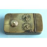 A brass combination puzzle box the hinged lid with twin circular Roman numeral dials and sliding