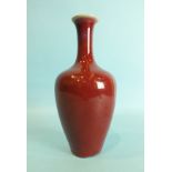 A Chinese sang du boeuf glaze baluster vase with impressed mark to base, 21.5cm high (slight chips