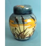 A modern Moorcroft ginger jar and cover decorated with the 'Reeds at Sunset' pattern, 15.5cm high,