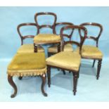 Five Victorian mahogany balloon-back dining chairs, with upholstered seats on tapered legs and a