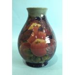 A modern (seconds) Moorcroft baluster pottery vase in the Finches & Fruit pattern, underglaze