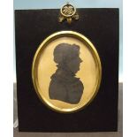 J H Gillespie (attrib.), an early-19th century painted silhouette portrait of a middle-aged woman,