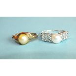 A 9ct white gold ring set cultured pearl between white-stone-set shoulders, size O and a 9ct gold