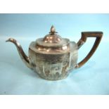 A George III shaped rectangular teapot with oval lid, pineapple finial and wood handle, decorated