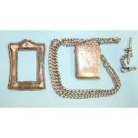 An Edwardian silver Vesta case, Birmingham 1904, on silver graduated Albert watch chain, (shackle