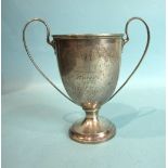 A plain two-handled trophy cup on circular foot, engraved Falmouth and Camborne Division Young