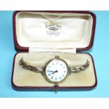 A lady's 9ct-gold-cased wrist watch, 28mm diameter, on gold sprung expanding bracelet, 24g, boxed.