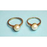 A 9ct gold ring set cultured pearl, size M and another, size N, (worn), total weight 5.7g, (2).