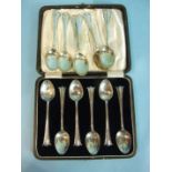 A cased set of six teaspoons, Birmingham 1915 and a set of six cased teaspoons, marks rubbed,