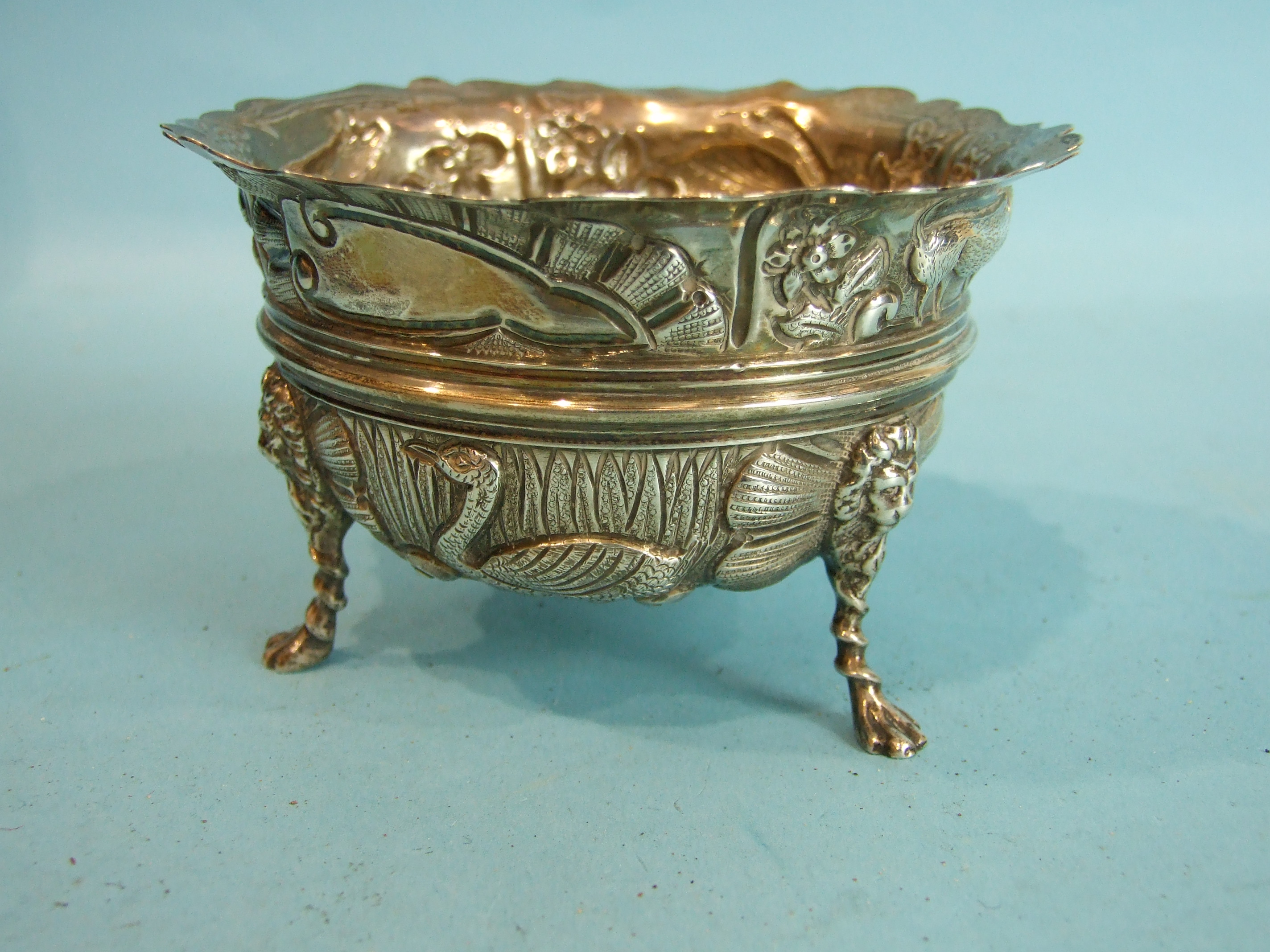 A late-Victorian sugar bowl embossed-overall with swans and pigs, on lion mask and paw feet, 11. - Image 2 of 3