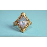 An amethyst ring with 9ct gold pierced mount, size P, 4g.
