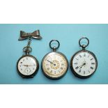A lady's Continental silver-cased keyless pocket watch with floral engraved back, suspended on