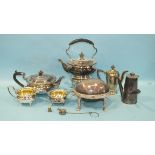 A silver-plated tea service and matching spirit kettle on stand, a small plated breakfast dish and a