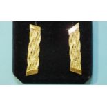 A pair of plaited gold earrings, (tested as 14ct), 3.9g, 4cm long.