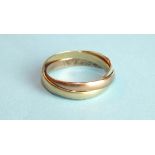 A 9ct tri-colour gold Russian wedding ring of three bands, size T, 3.6g.