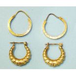 A pair of 14ct gold hoop earrings, 1.9g and a matched pair of hoop earrings, one marked 14k, the
