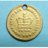 An 1806 George III third-guinea, 2.8g, (holed).