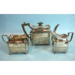 A late-Victorian half-reeded three-piece tea service of oblong shape, on ball feet, Sheffield