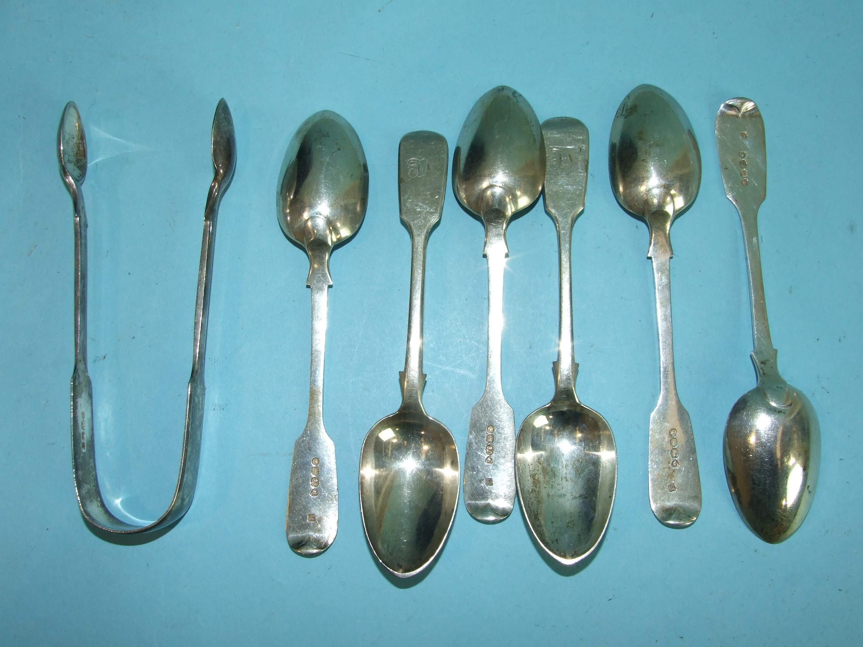 Two Old English pattern tablespoons and five dessert spoons, various mid-20th century dates,