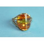 An 18ct gold ring, claw-set a fancy-cut topaz, size N, 4.9g.