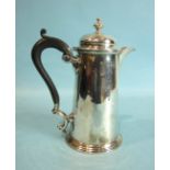 A plain tapered coffee pot with finialled lid, Sheffield 1905, 21cm high and a hot water jug, London