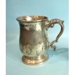 A baluster-shaped pint tankard with leaf-capped scroll handle, and presentation engraving,