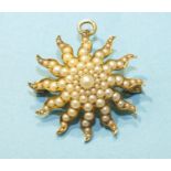 A Victorian pearl-set sun brooch/pendant marked 16A, 29mm diameter, 6.4g.